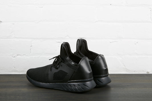 Pair of Black Sneakers Back